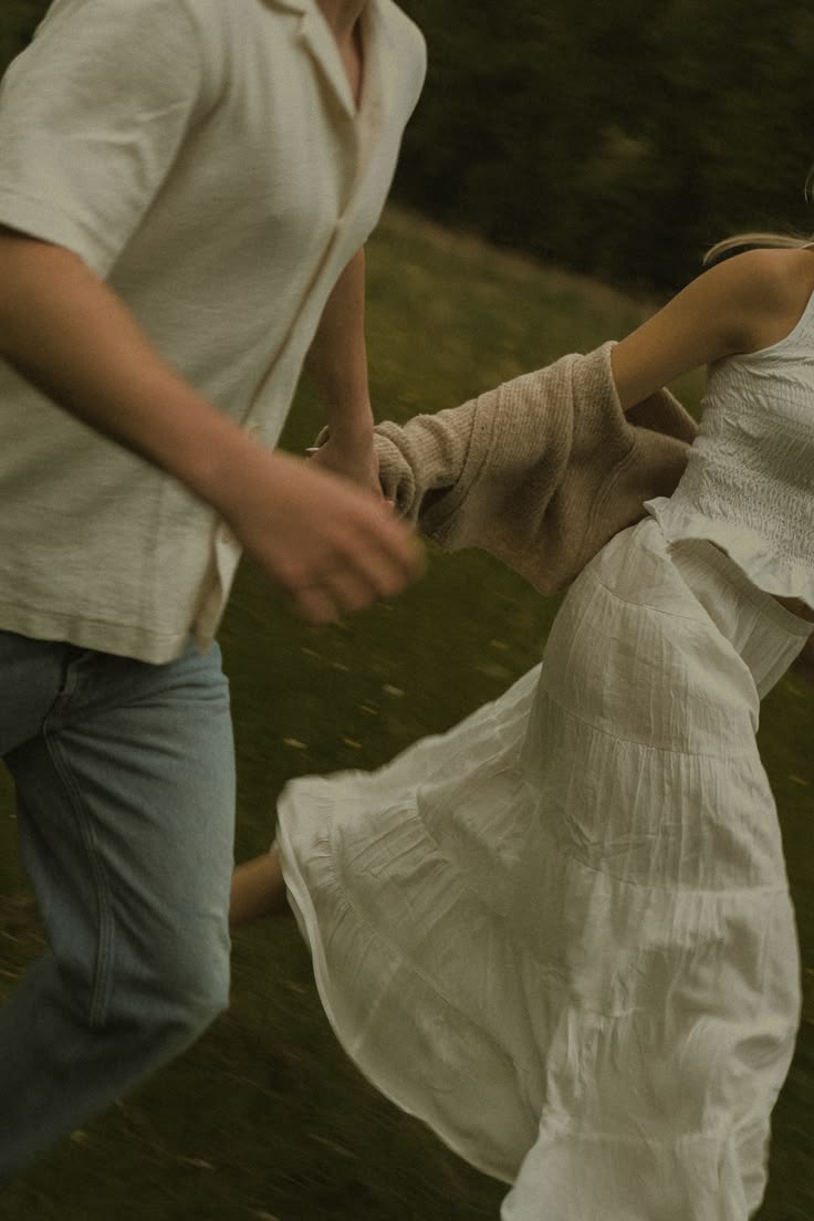 Camel slip dress with knit shirt in open field