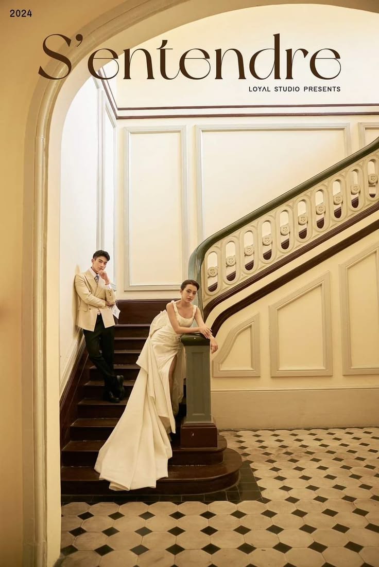 Cream blazer and champagne satin gown on a heritage staircase