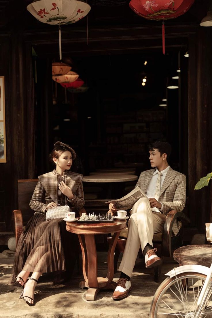 Checked jacket and pleated skirt with a cream suit, vintage café