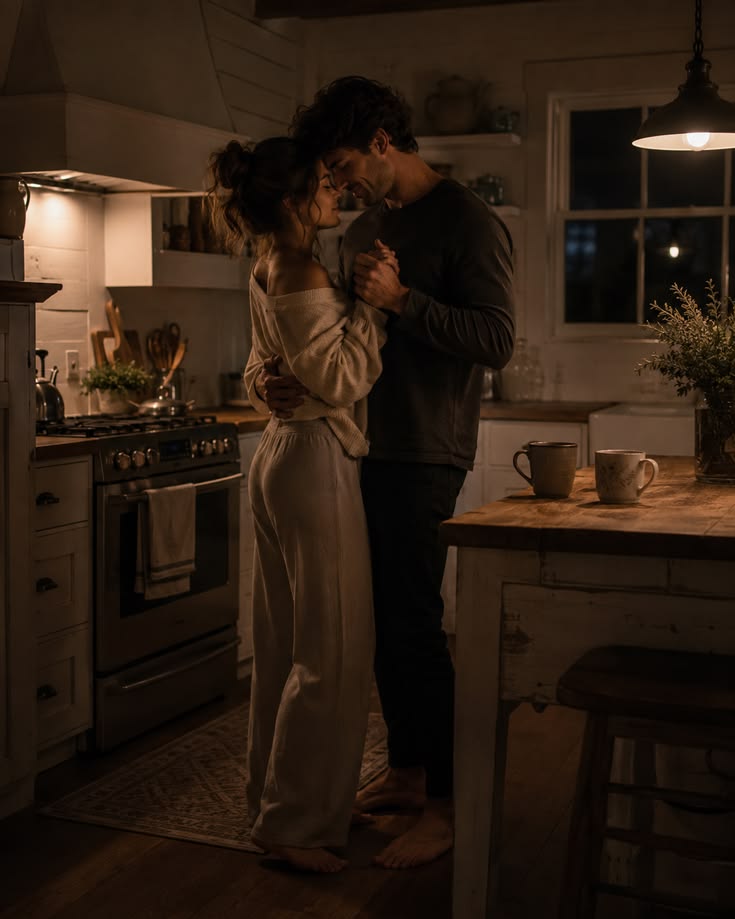 Slow kitchen dance in off-shoulder knit and relaxed trousers